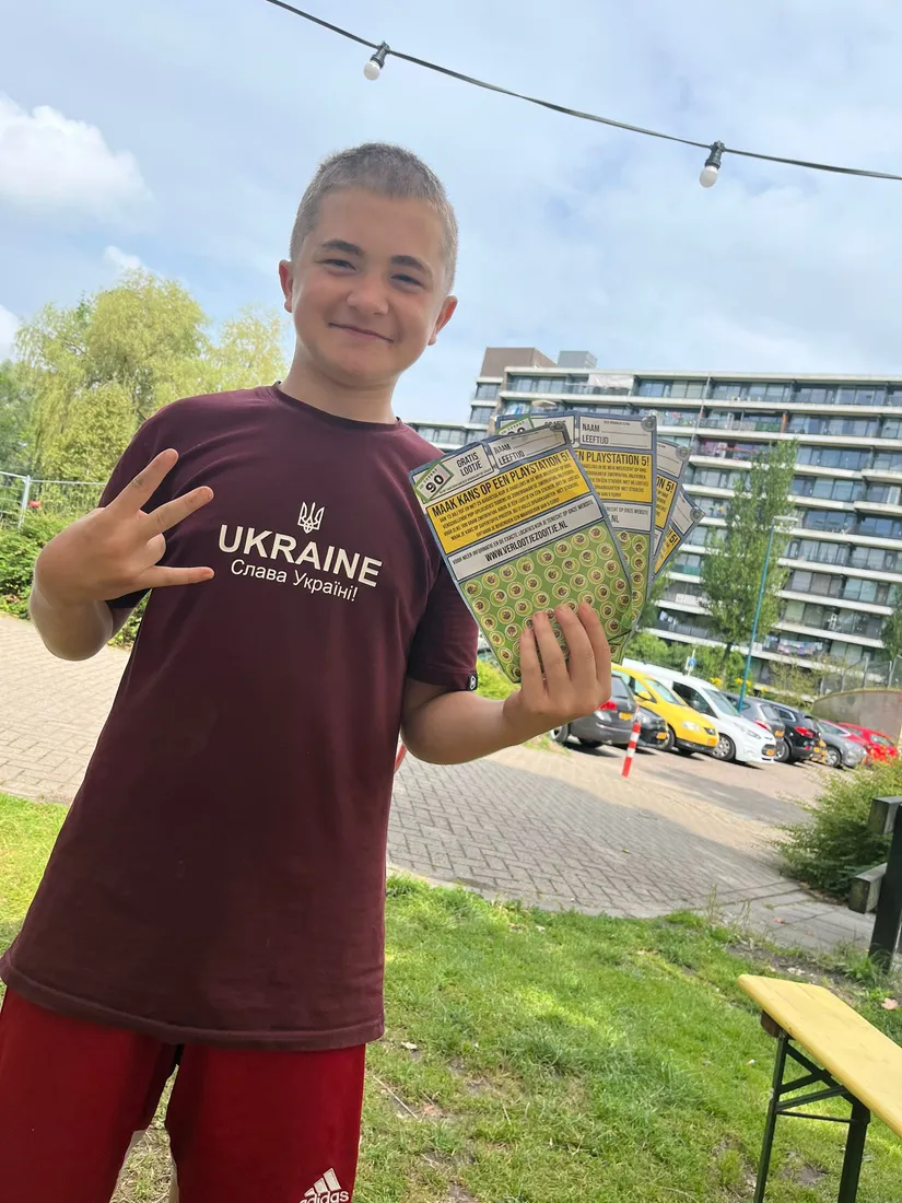 Kinderen in actie bij Verloot je Zooitje — sfeerfoto 11